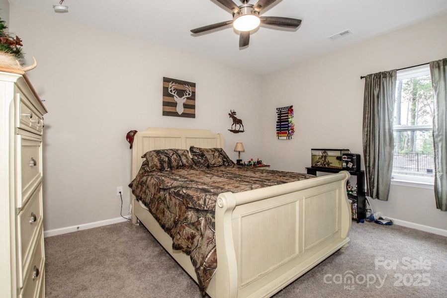 Furnished interior view inside a new home in Signature at Reid's Cove, Mooresville (Image 13).