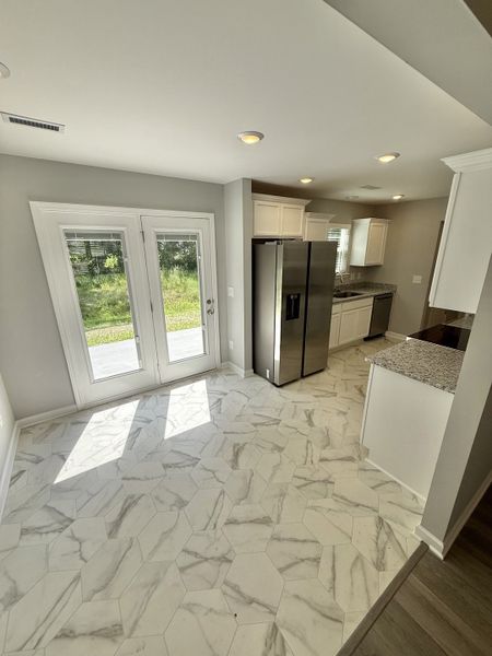 Spacious, unfurnished interior of a new home in Stonehenge, Manchester (Image 6). Spacious, unfurnished interior of a new home in Stonehenge, Manchester (Image 6).