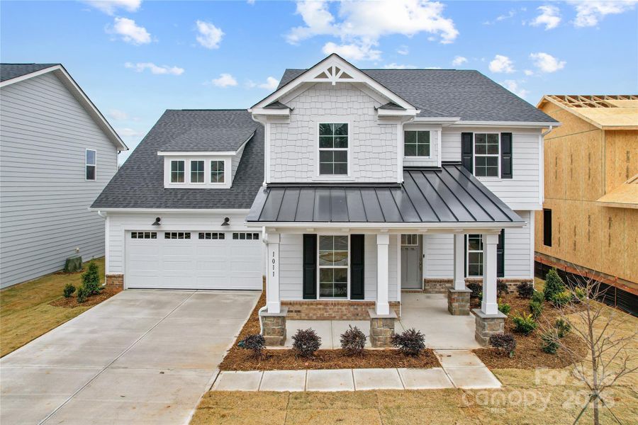 Front exterior of a new home in Forest Creek, Waxhaw, NC, highlighting curb appeal (Image 5).