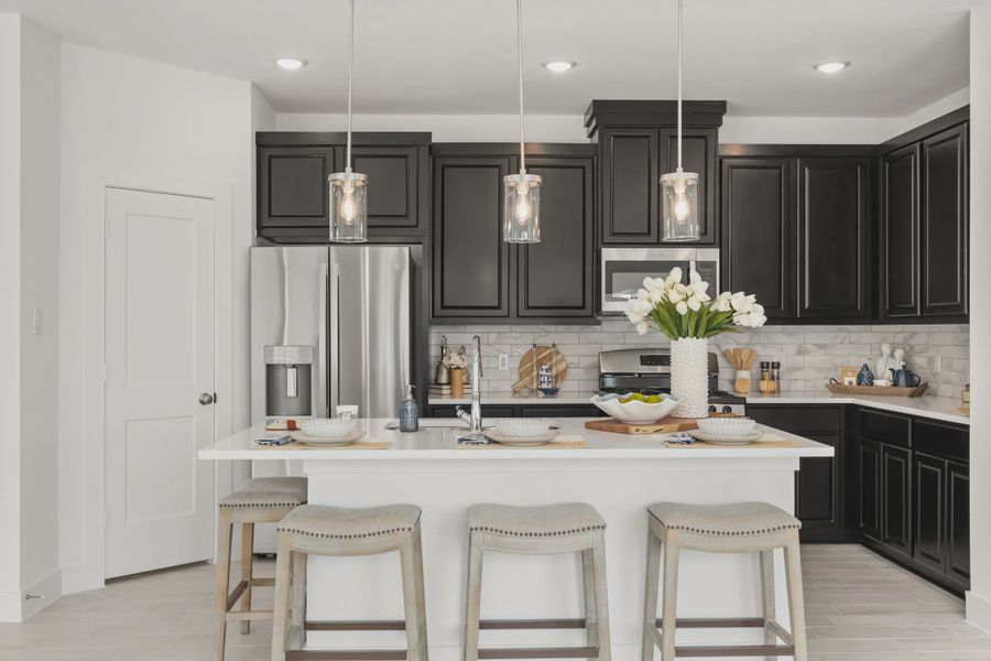 Representative furnished interior of a home built from the Chalet by Chesmar Homes in Meridiana Townhomes, Iowa Colony (Image 14).