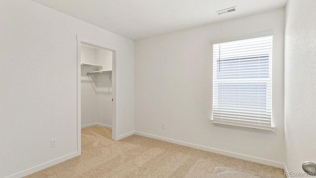 Spacious, unfurnished interior of a new home in The Ridge at Lorson Ranch, Colorado Springs (Image 18).