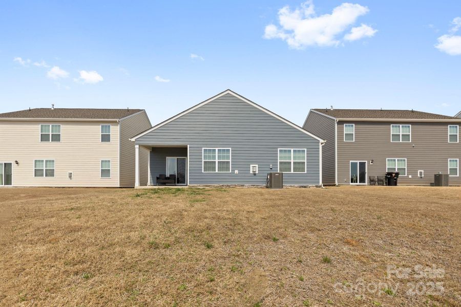 Exterior details and patio area of a home in Secrest Commons, Monroe (Image 3).