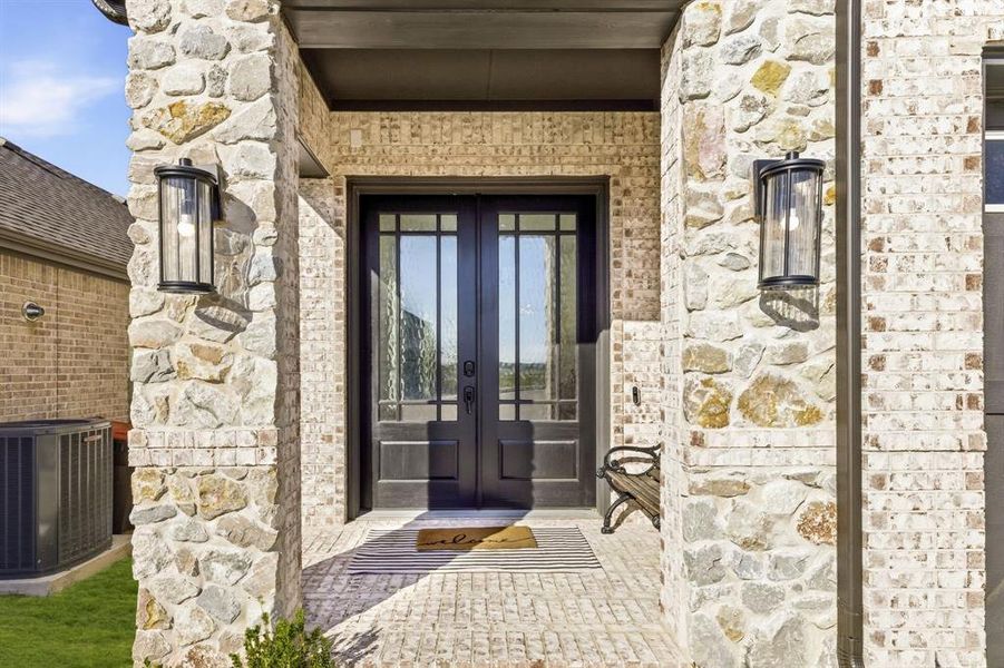 Exterior details and patio area of a home in The Villages of Hurricane Creek, Anna (Image 3).