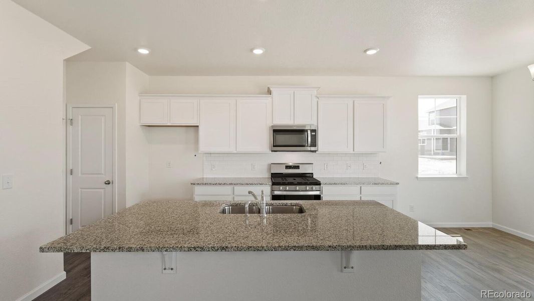 Furnished interior view inside a new home in Prairie Song, Windsor (Image 6).