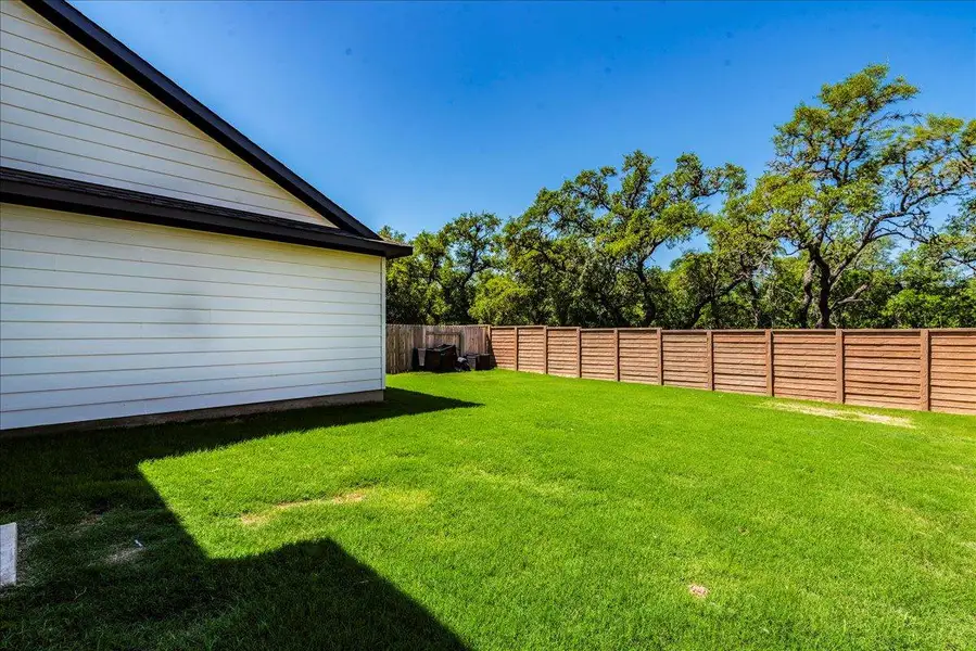 Exterior details and patio area of a home in , Kyle (Image 4).