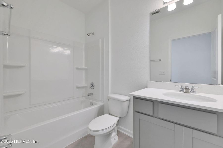 Furnished interior view inside a new home in Amberly, Green Cove Springs (Image 9).