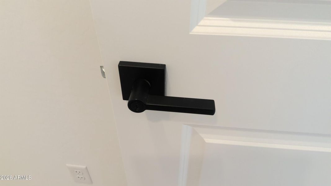 Matte black lever door hardware