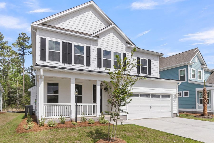 Front exterior of a new home in Phillips Crossing, Ridgeville, SC, highlighting curb appeal (Image 19).