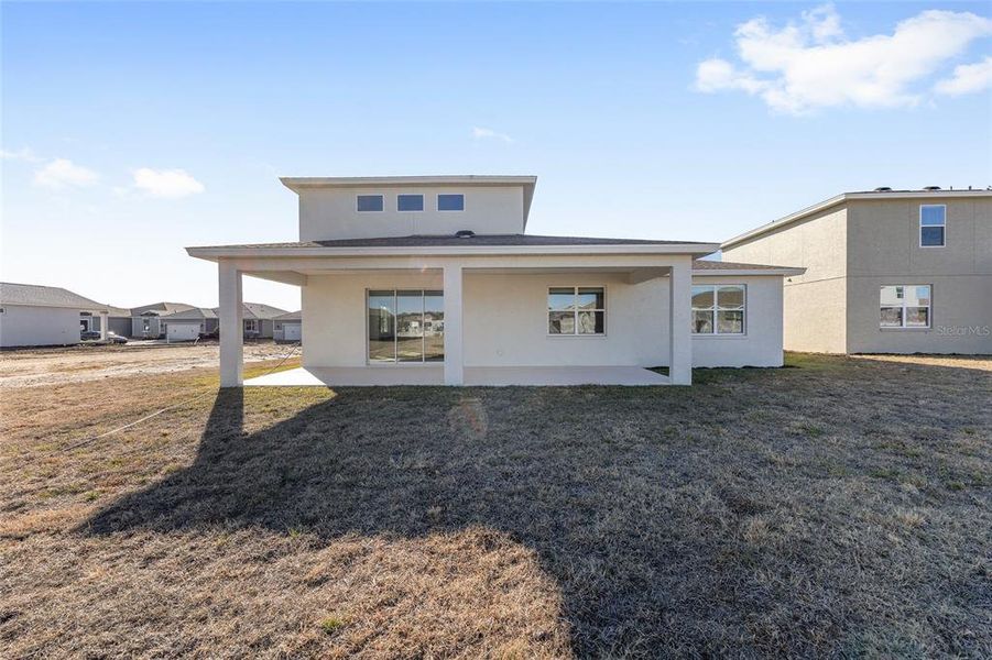 Exterior details and patio area of a home in Calesa Township, Ocala (Image 26).