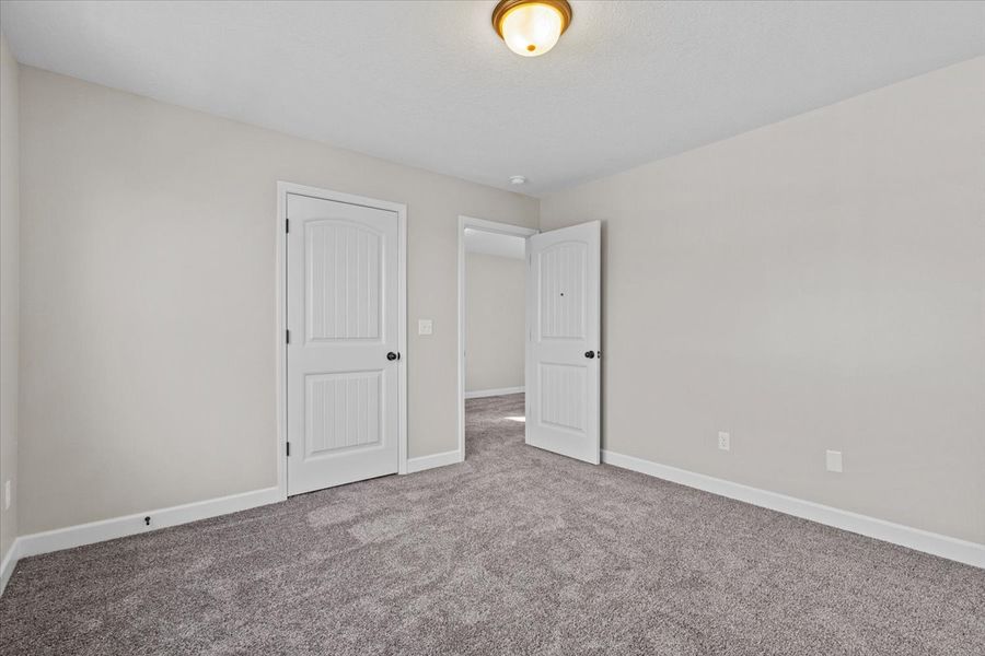 Representative unfurnished interior of a home built from the Iris by Enchanted Homes in Hampshire Heights, Moore (Image 16).
