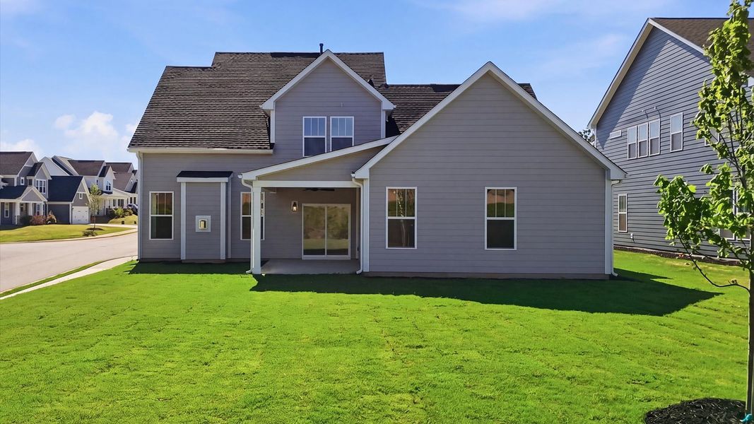 Vibrant rear outdoor space featuring a covered porch and exceptional craftsmanship Vibrant rear outdoor space featuring a covered porch and exceptional craftsmanship