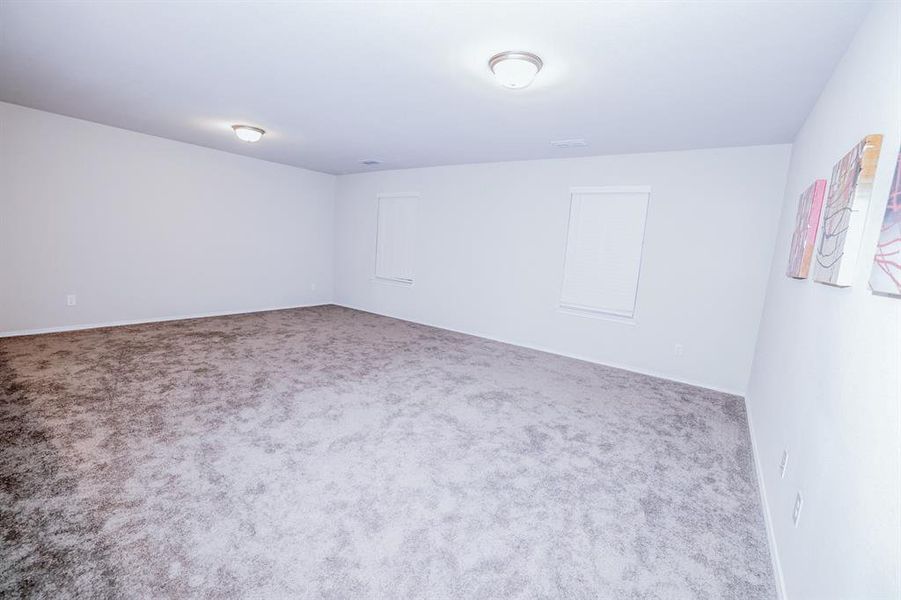 View of carpeted spare room