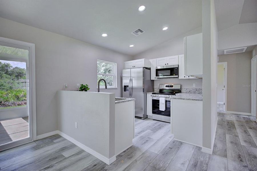 Furnished interior view inside a new home in , Avon Park (Image 5).