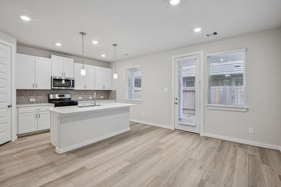 Furnished interior view inside a new home in Spring Brook Village - City Series, Houston (Image 9). Furnished interior view inside a new home in Spring Brook Village - City Series, Houston (Image 9).