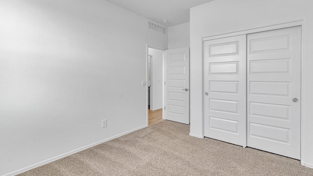 Spacious, unfurnished interior of a new home in Coronet at Gladden Farms, Marana (Image 38). Spacious, unfurnished interior of a new home in Coronet at Gladden Farms, Marana (Image 38).