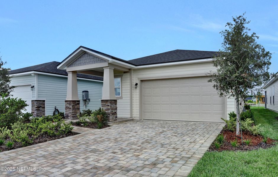 Front exterior of a new home in , St. Augustine, FL, highlighting curb appeal (Image 1). Front exterior of a new home in , St. Augustine, FL, highlighting curb appeal (Image 1).