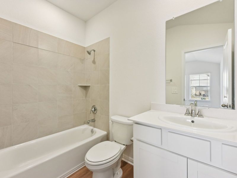 Furnished interior view inside a new home in Lexington Parke, Del Valle (Image 4).