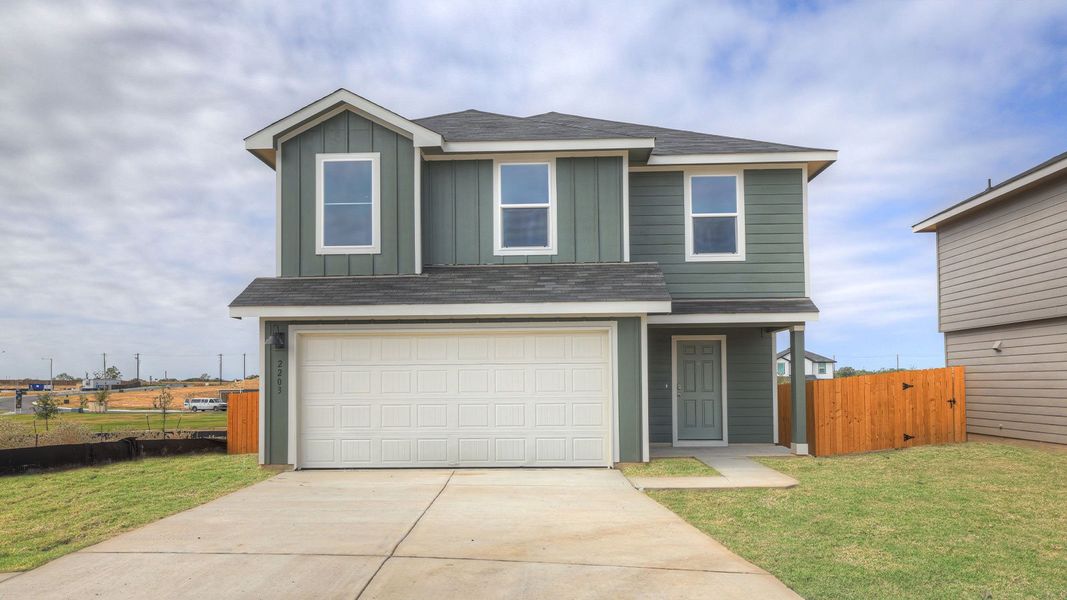 Front exterior of a new home in Ladera, Luling, TX, highlighting curb appeal (Image 22).