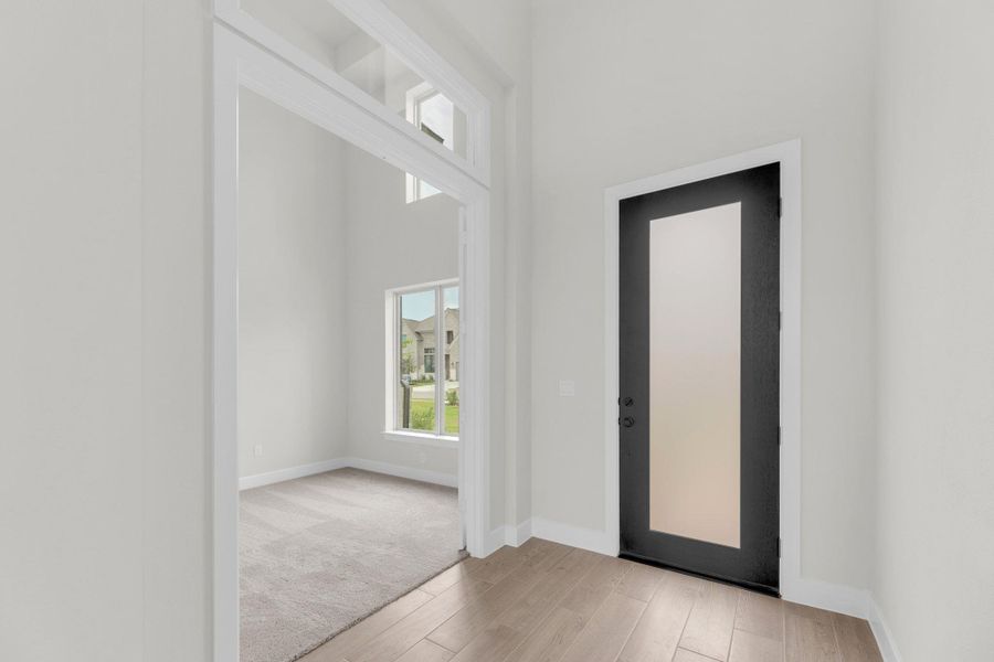 Spacious, unfurnished interior of a new home in Santa Rita Ranch - 60', Liberty Hill (Image 18). Spacious, unfurnished interior of a new home in Santa Rita Ranch - 60', Liberty Hill (Image 18).