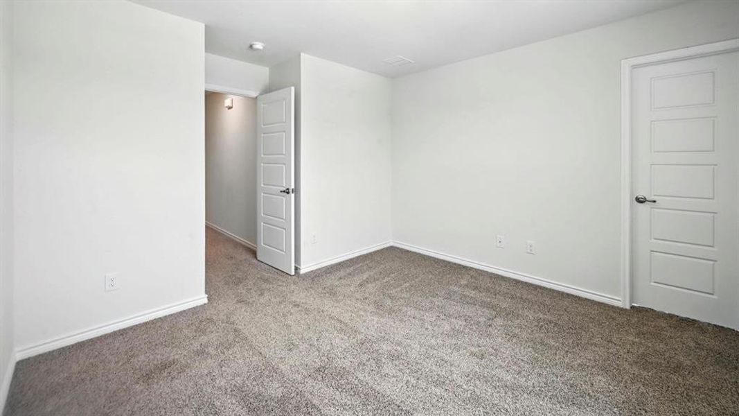 Unfurnished room featuring carpet floors and baseboards Unfurnished room featuring carpet floors and baseboards