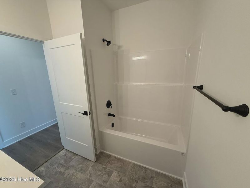 Spacious, unfurnished interior of a new home in Wood Creek Landing, Leland (Image 18).