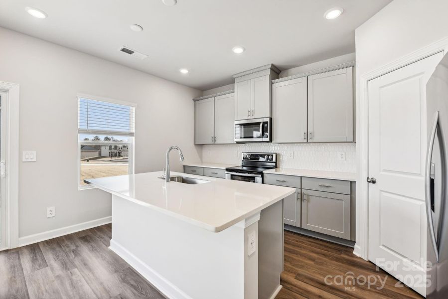 Furnished interior view inside a new home in Harper Landing, Stanley (Image 5).