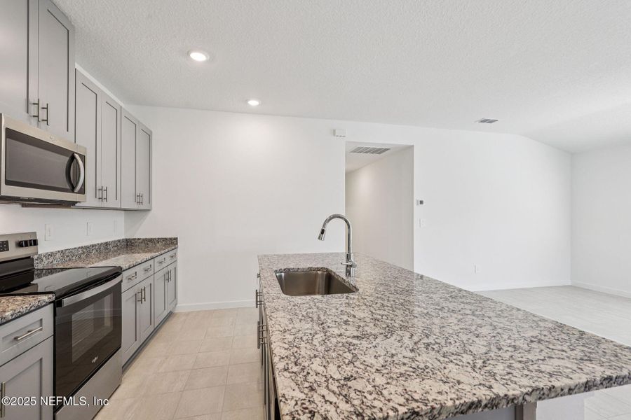 Furnished interior view inside a new home in Azalea Creek, Jacksonville (Image 7).