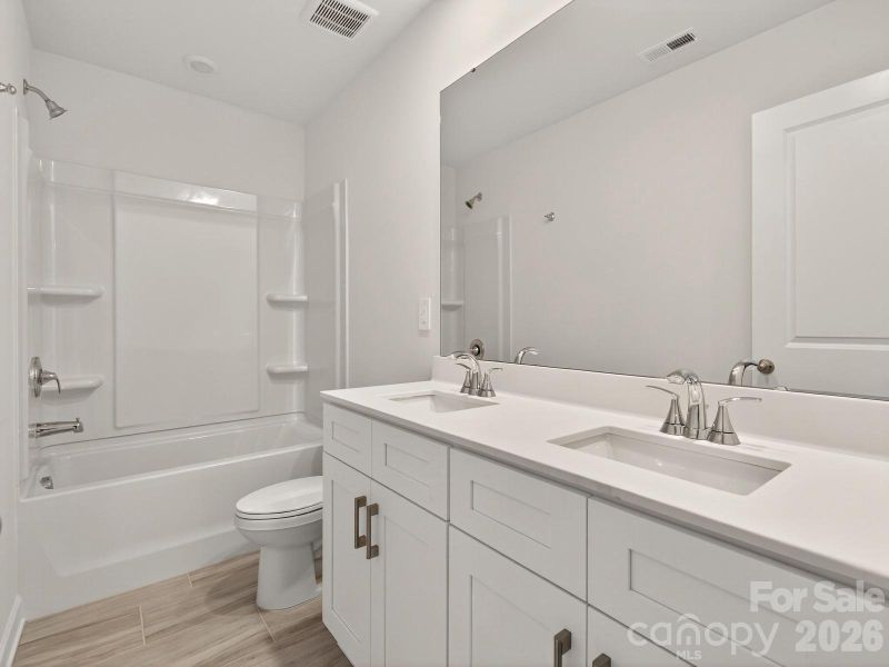 Photo is not of the actual home, but is an inspirational photo of builder’s model home and may depict options, furnishings, and/or decorator features that are not included