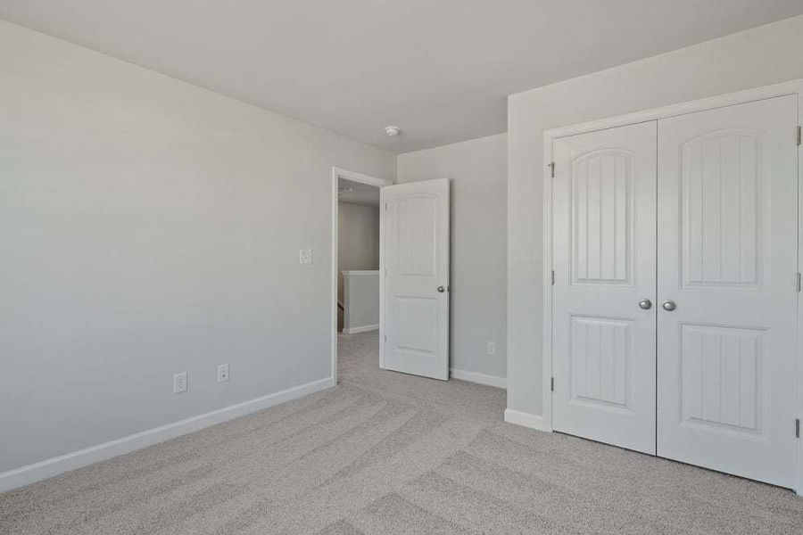Representative unfurnished interior of a home built from the Camellia by Caviness & Cates Communities in Bartlett Manor, Youngsville (Image 62).