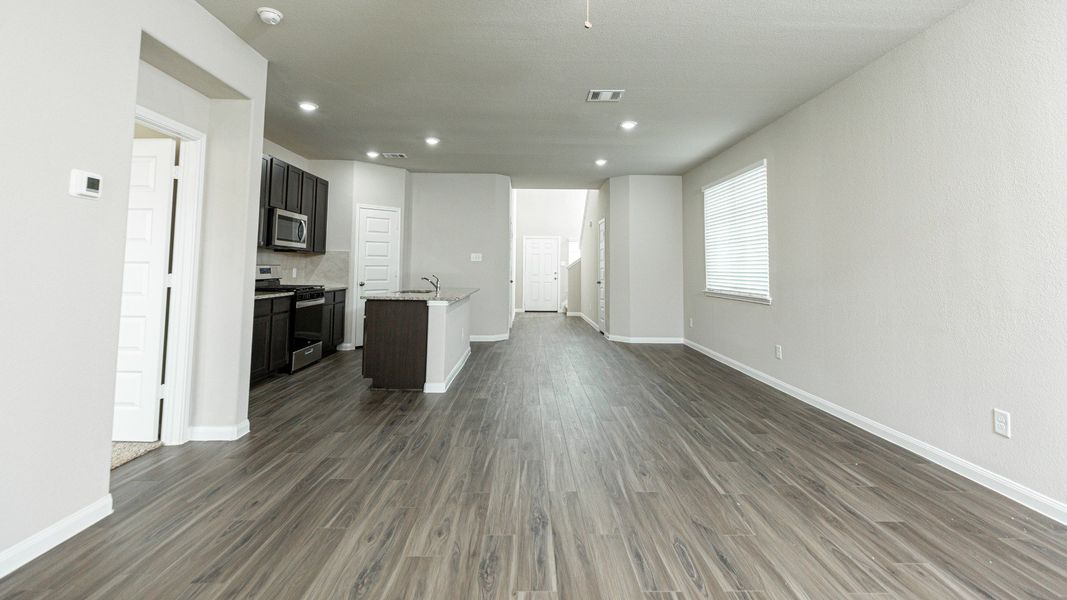 Family Room to Dining Area and Kitchen