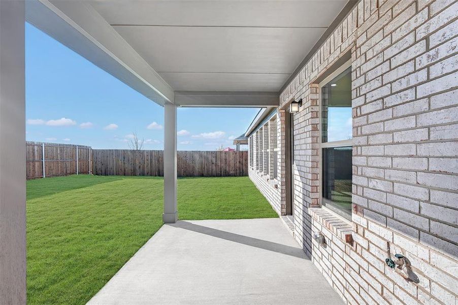 Exterior details and patio area of a home in Verandah, Royse City (Image 4).