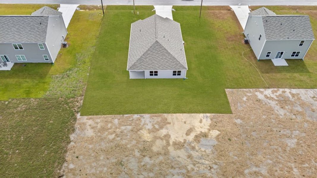 Exterior details and patio area of a home in Wilson's Ridge, Wilson's Mills (Image 24).