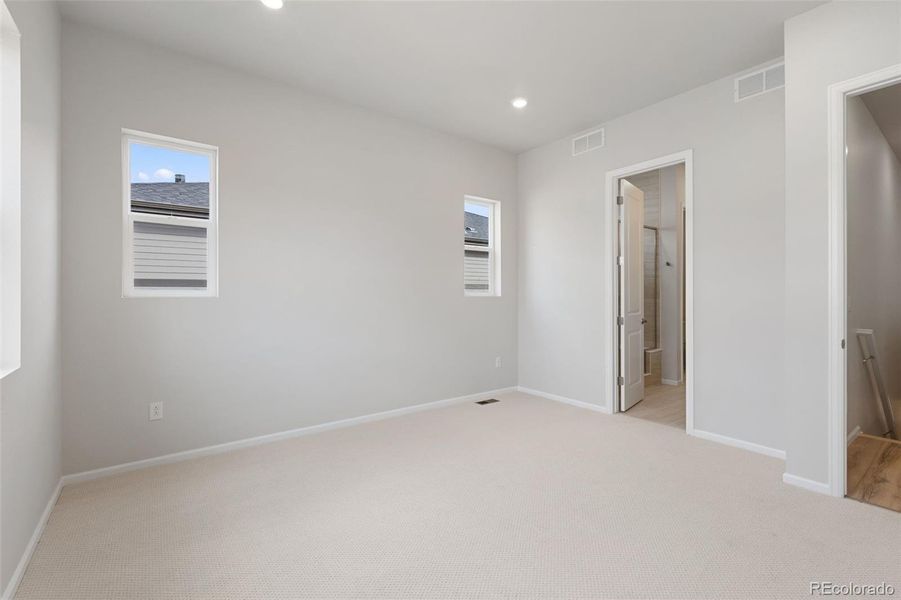 Spacious, unfurnished interior of a new home in The Manors Collection at Golden Overlook, Lakewood (Image 15).