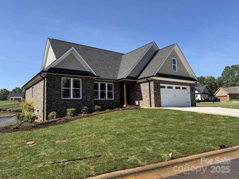 Front exterior of a new home in , Conover, NC, highlighting curb appeal (Image 20).