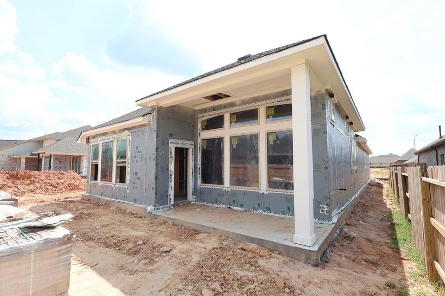 Front exterior of a new home in Escondido 45’ Homesites, Magnolia, TX, highlighting curb appeal (Image 1). Front exterior of a new home in Escondido 45’ Homesites, Magnolia, TX, highlighting curb appeal (Image 1).