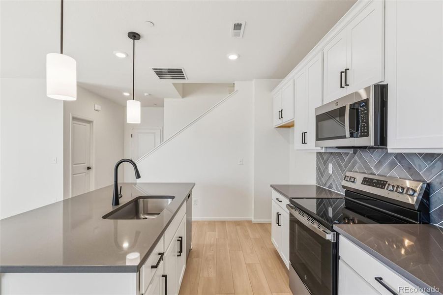 Furnished interior view inside a new home in Turnberry, Commerce City (Image 7).