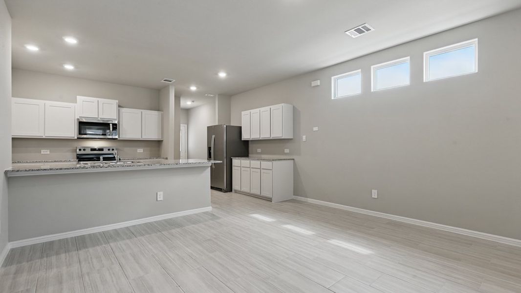 Representative furnished interior of a home built from the NUTMEG by D.R. Horton in Orchard Village, Fort Worth (Image 10). Representative furnished interior of a home built from the NUTMEG by D.R. Horton in Orchard Village, Fort Worth (Image 10).