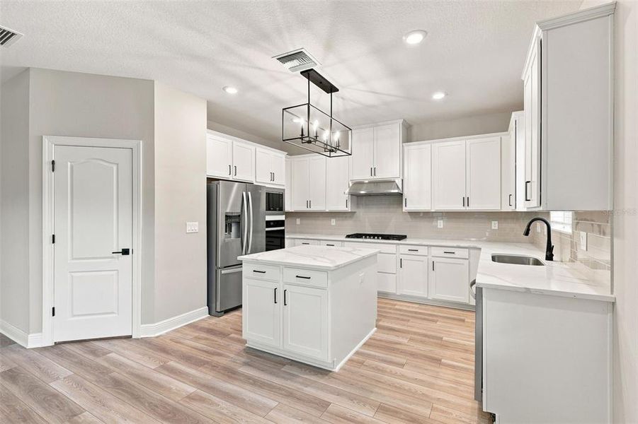 Furnished interior view inside a new home in Reunion Village, Kissimmee (Image 6).