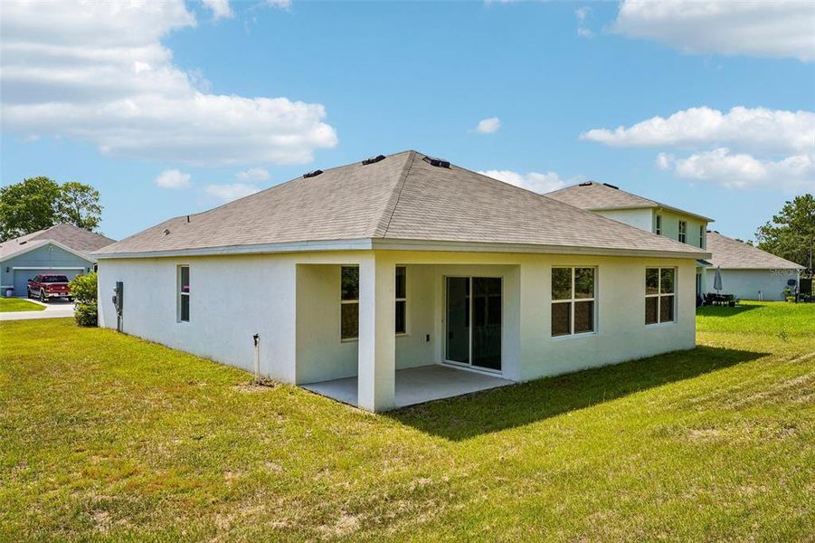 Exterior details and patio area of a home in Lake Diamond, Ocala (Image 24).