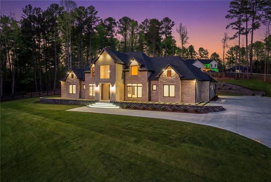 Front exterior of a new home in , Dacula, GA, highlighting curb appeal (Image 26).