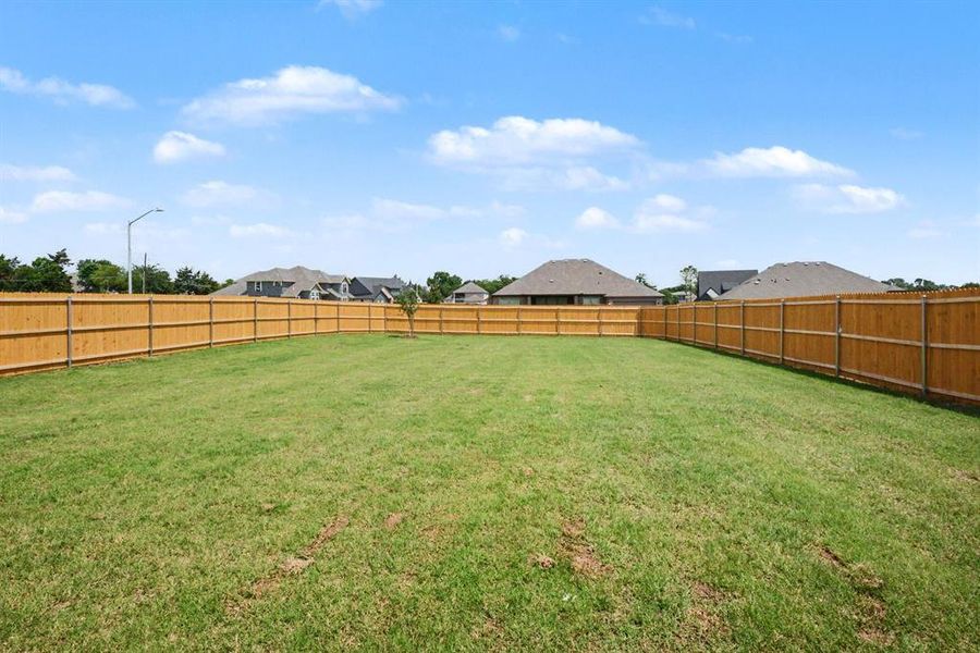 Exterior details and patio area of a home in Ten Mile Creek Estates, DeSoto (Image 4).