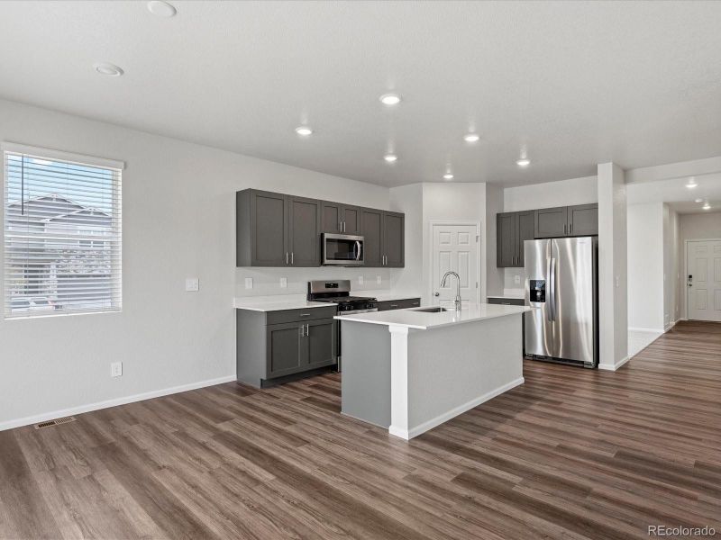 Furnished interior view inside a new home in Ridgeline Vista: The Flora Collection, Brighton (Image 20). Furnished interior view inside a new home in Ridgeline Vista: The Flora Collection, Brighton (Image 20).