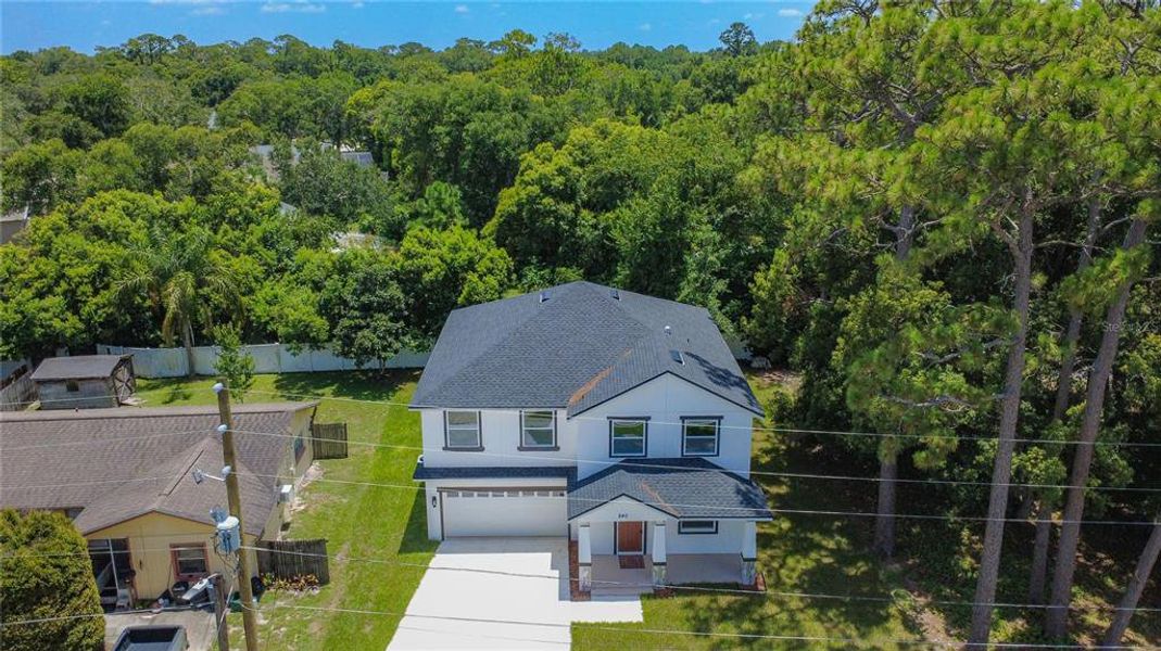Front exterior of a new home in , Casselberry, FL, highlighting curb appeal (Image 19). Front exterior of a new home in , Casselberry, FL, highlighting curb appeal (Image 19).