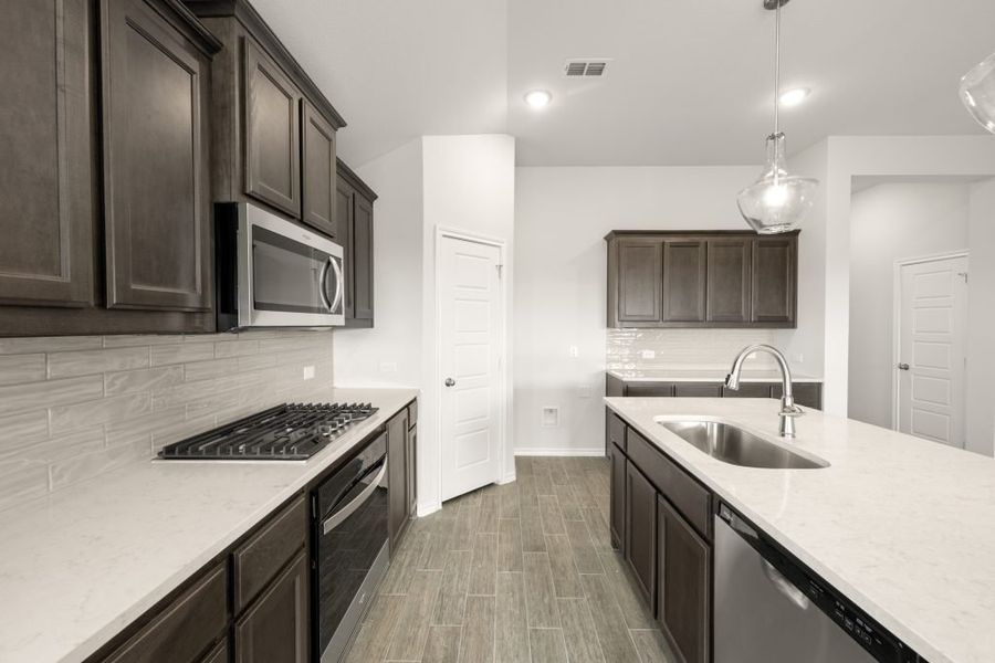 Front exterior of a new home in Myrtle Creek, Waxahachie, TX, highlighting curb appeal (Image 9).