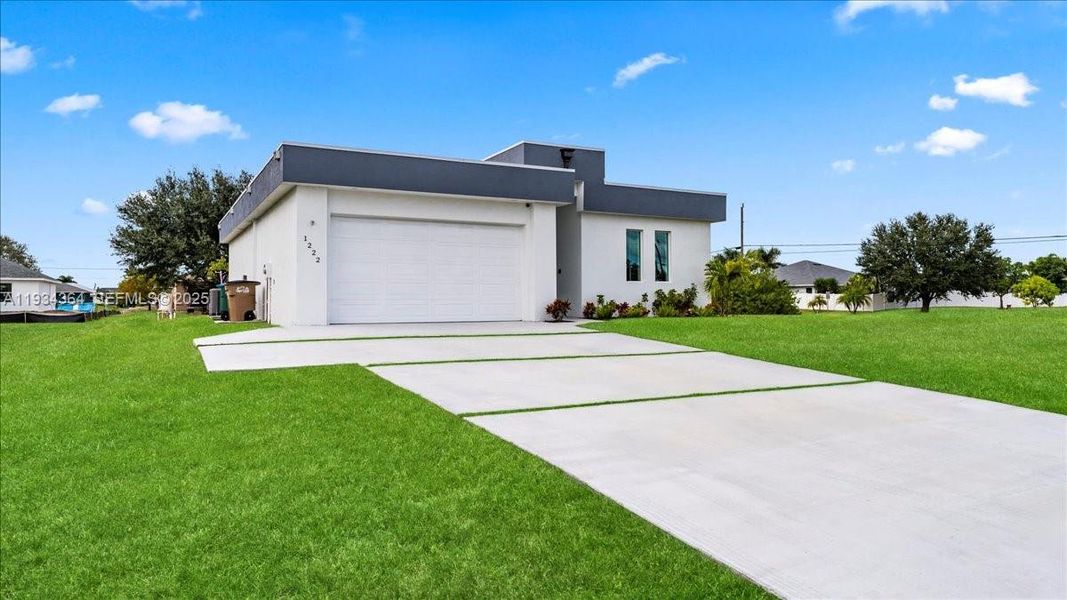 Front exterior of a new home in , Cape Coral, FL, highlighting curb appeal (Image 22).