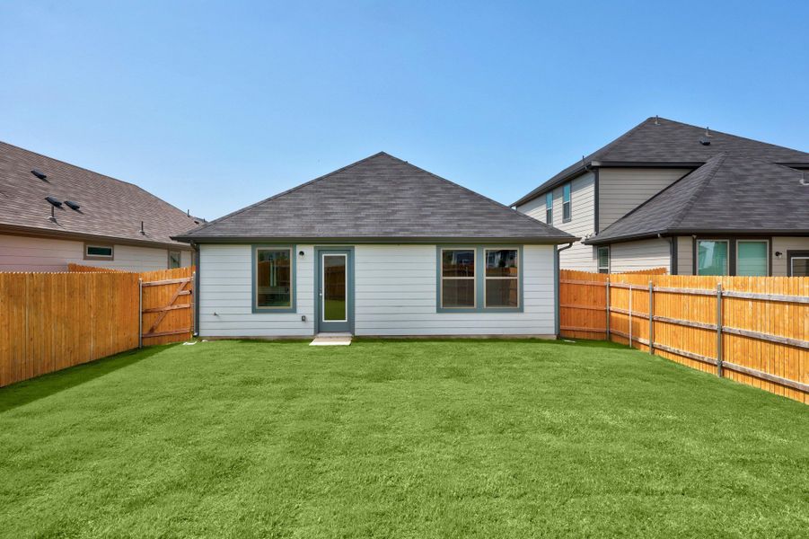 Exterior details and patio area of a home in Trinity Ranch, Elgin (Image 3).