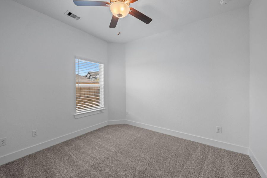 Spacious, unfurnished interior of a new home in Meridiana, Iowa Colony (Image 14).