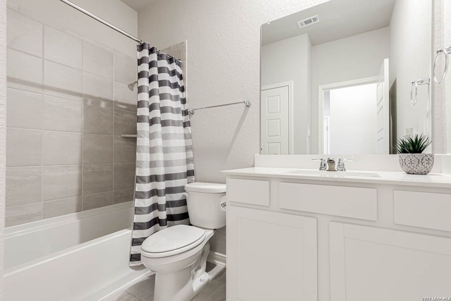Furnished interior view inside a new home in Remington Ranch, San Antonio (Image 13).