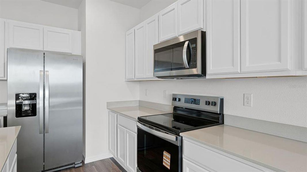 Furnished interior view inside a new home in Harmony at Lake Eloise, Winter Haven (Image 7).