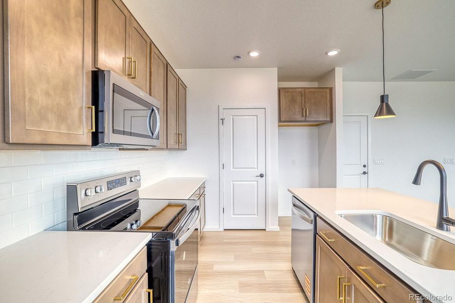 Furnished interior view inside a new home in Harvest Crossing, Aurora (Image 5). Furnished interior view inside a new home in Harvest Crossing, Aurora (Image 5).